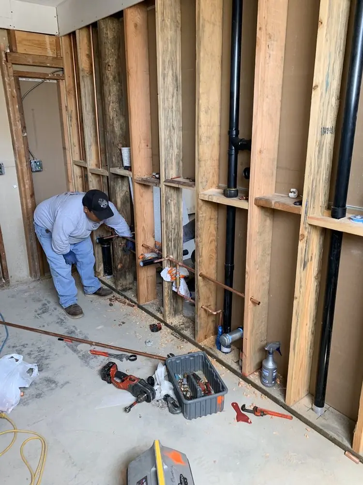 Commercial rough-in plumbing for Water Heater Replacement in Livonia